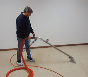 carpet cleaning with disinfecting solution in March 2020